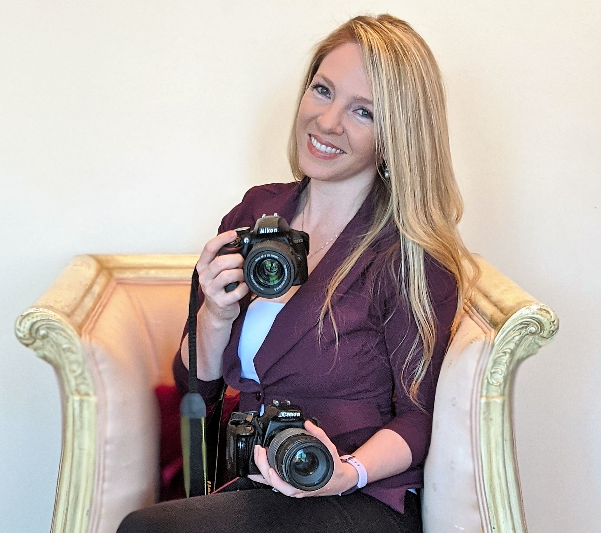 Photo of Owner of Cherish the Chapter Photography in antique pink chair